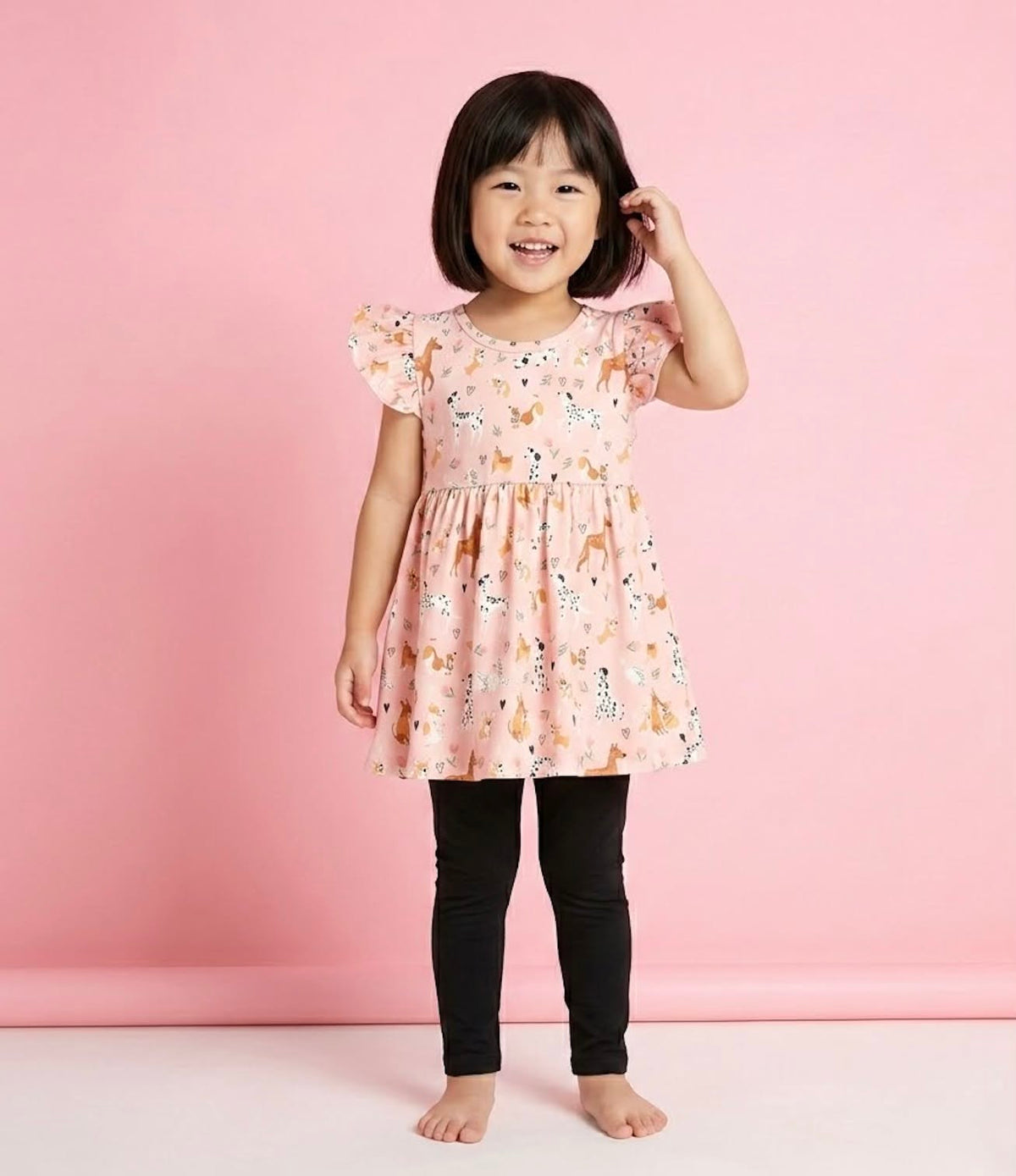 Playful Paws 2-Piece Set - model wearing dog print flutter top and black leggings