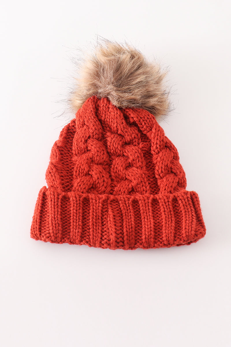 Caramel adult cable-knit beanie with a fluffy pompom