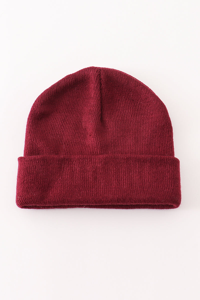 Burgundy ribbed knit beanie hat with a fold-over cuff