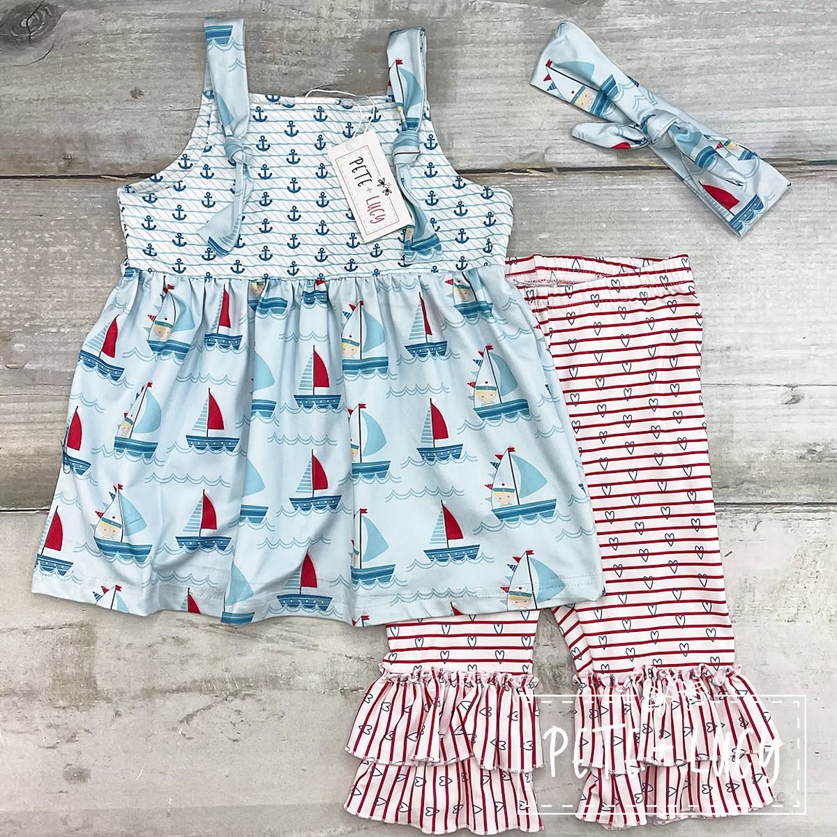 Pete + Lucy Ahoy Matey ruffle pant set with sailboats and striped ruffle pants