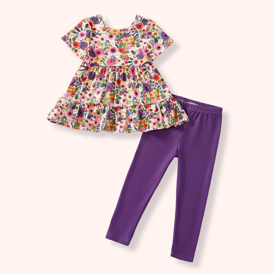 Bloom Burst 2 Piece Set flat lay - floral ruffle top and purple leggings