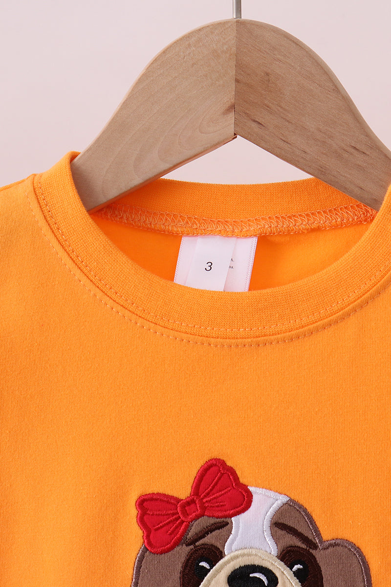 Orange puppy applique top size tag detail