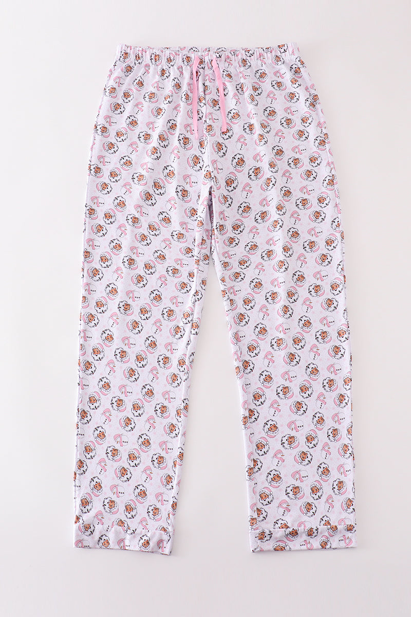 Full-length pink pajama pants with a repeating Santa Claus and snowman Christmas print
