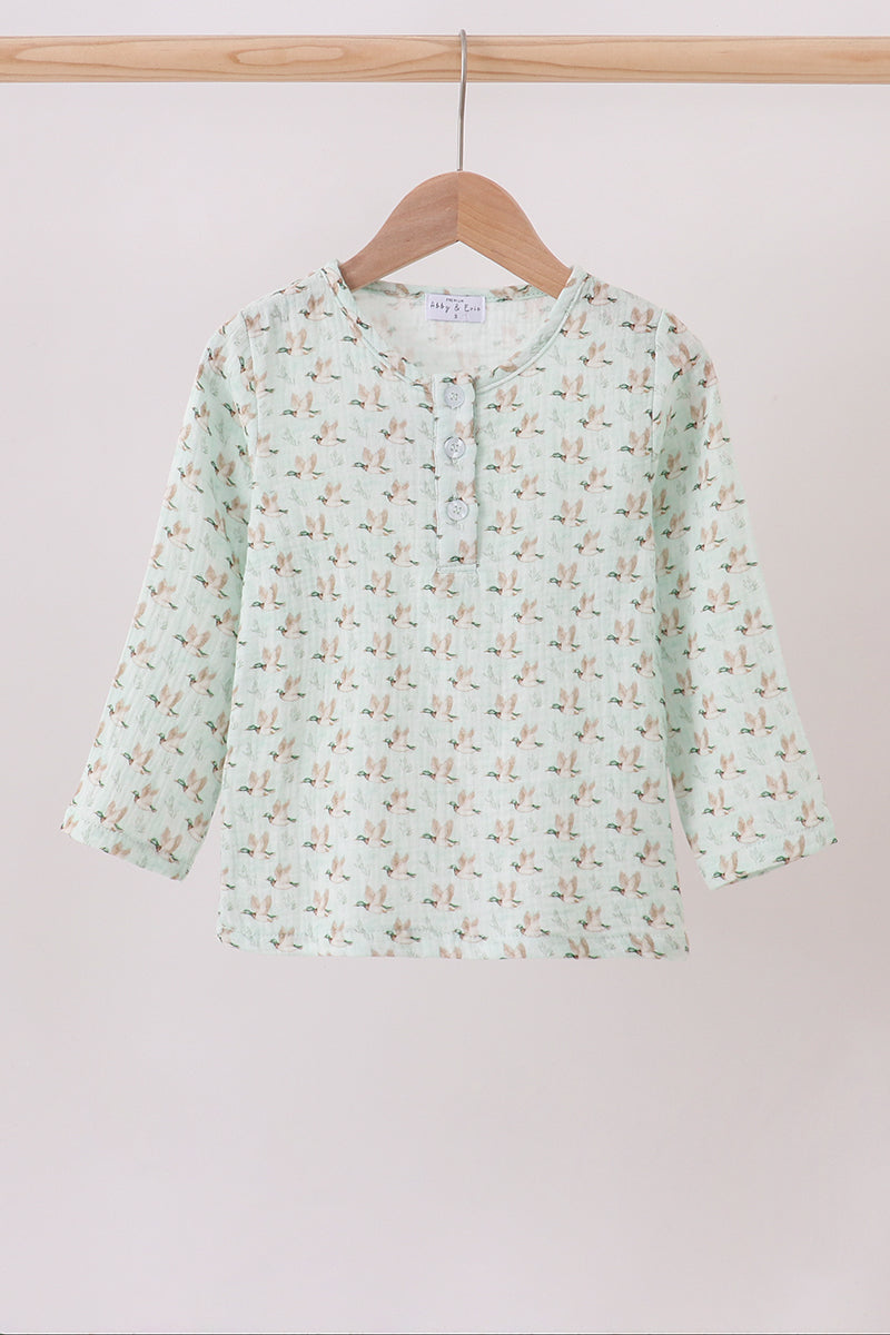 Duck print muslin top button placket detail