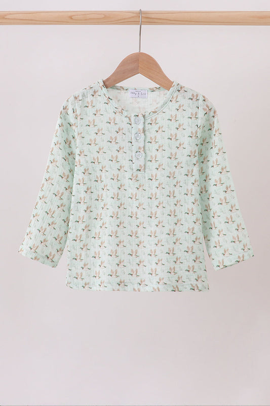 Duck print muslin top button placket detail