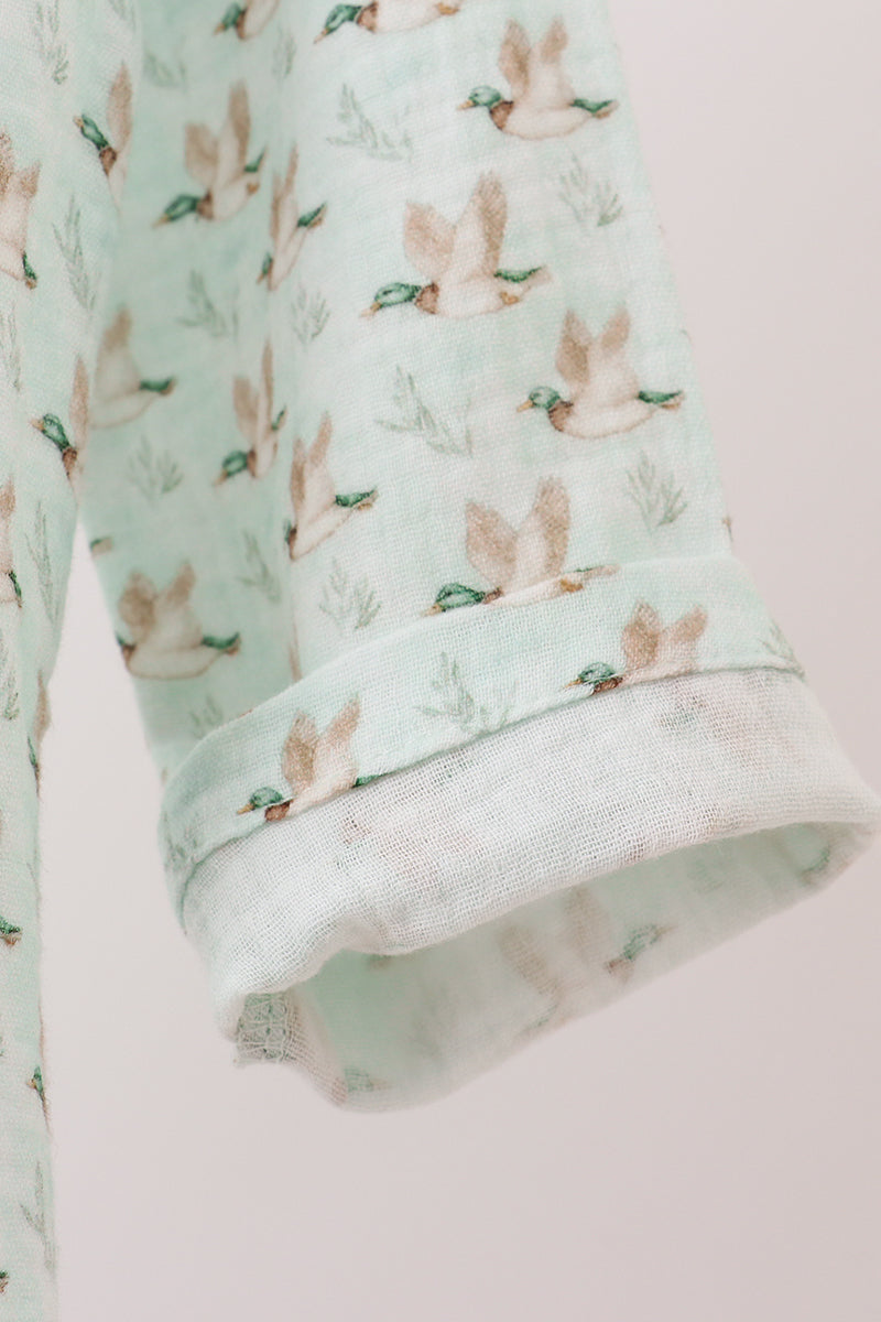 Duck print muslin top fabric folded