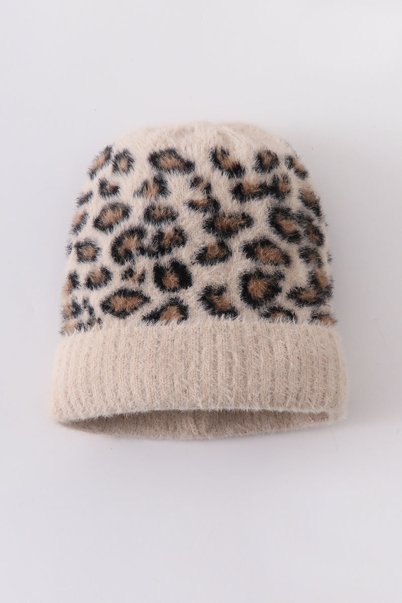 Beige leopard-print knit beanie with a soft fuzzy texture