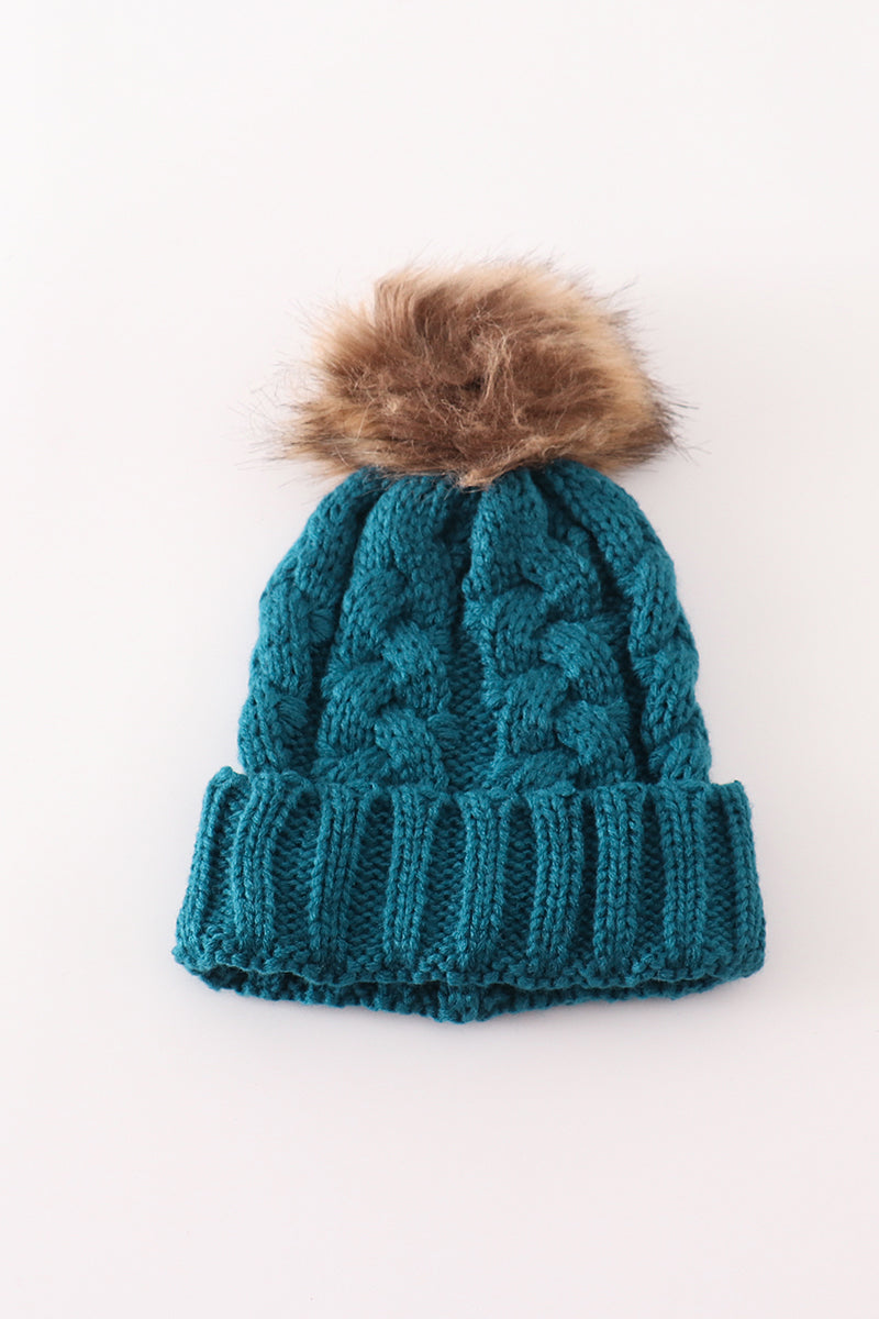 Teal adult cable-knit beanie with a fluffy pompom