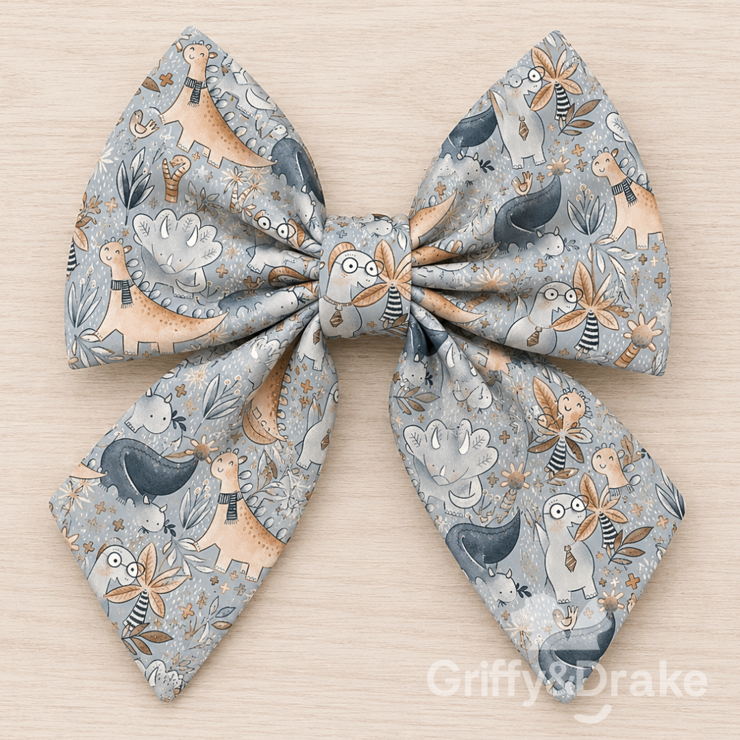 Jurassic Tails Sailor Bow by Griffy & Drake - whimsical dinosaur print