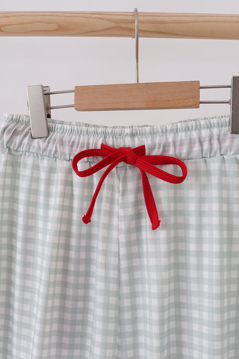 Sage gingham mom pajama pants shown in size M