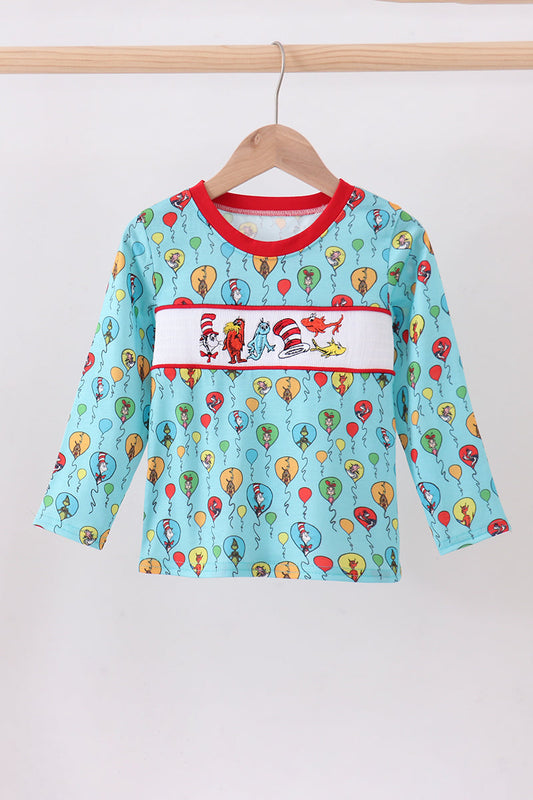 Mint Dr. Seuss smocked top front on hanger