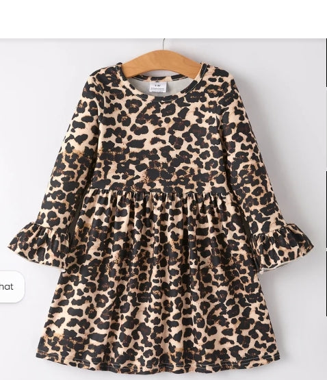 Front of all-over leopard-print girls dress with long sleeves and ruffled cuffs.