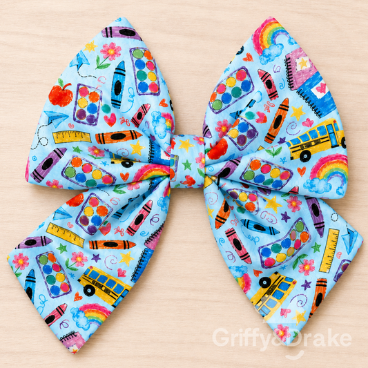 Teacher's Pet Sailor Bow - oversized back to school print pet bow with crayons, paint sets and school buses
