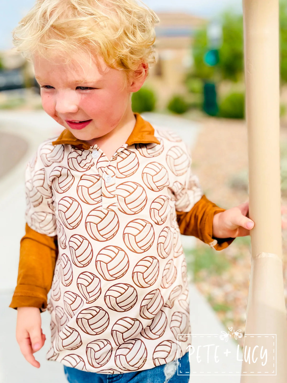 Close-up of Pete + Lucy vintage sports boy top