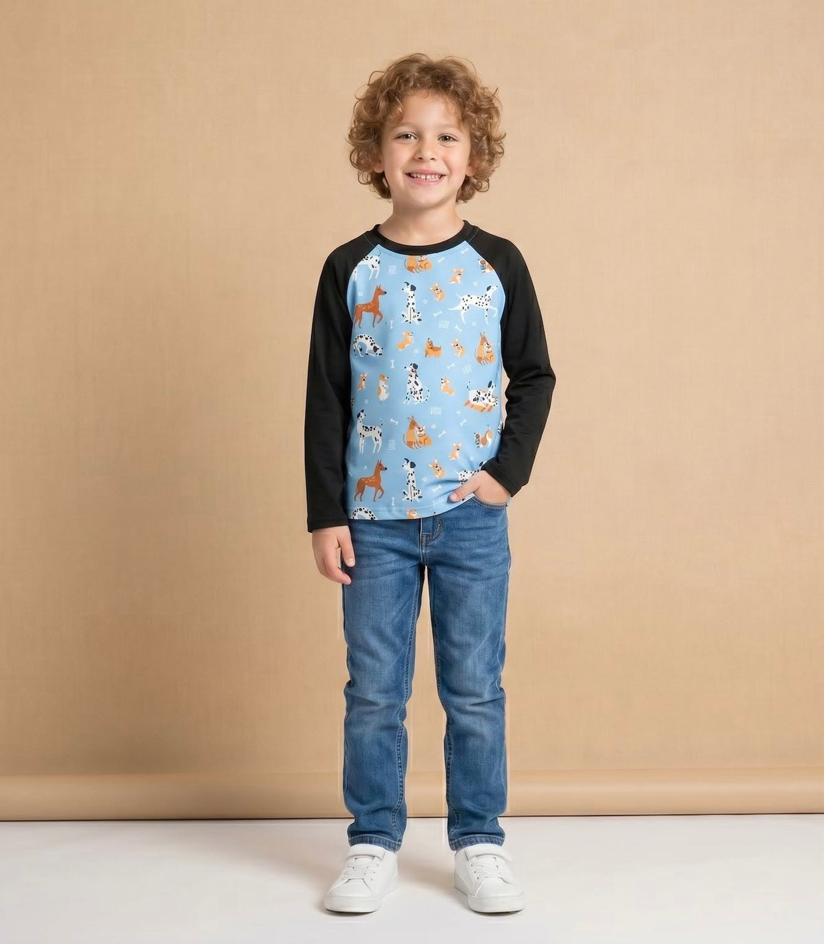 Playful Paws Boy Shirt on model - boy wearing light blue dog print raglan shirt with jeans