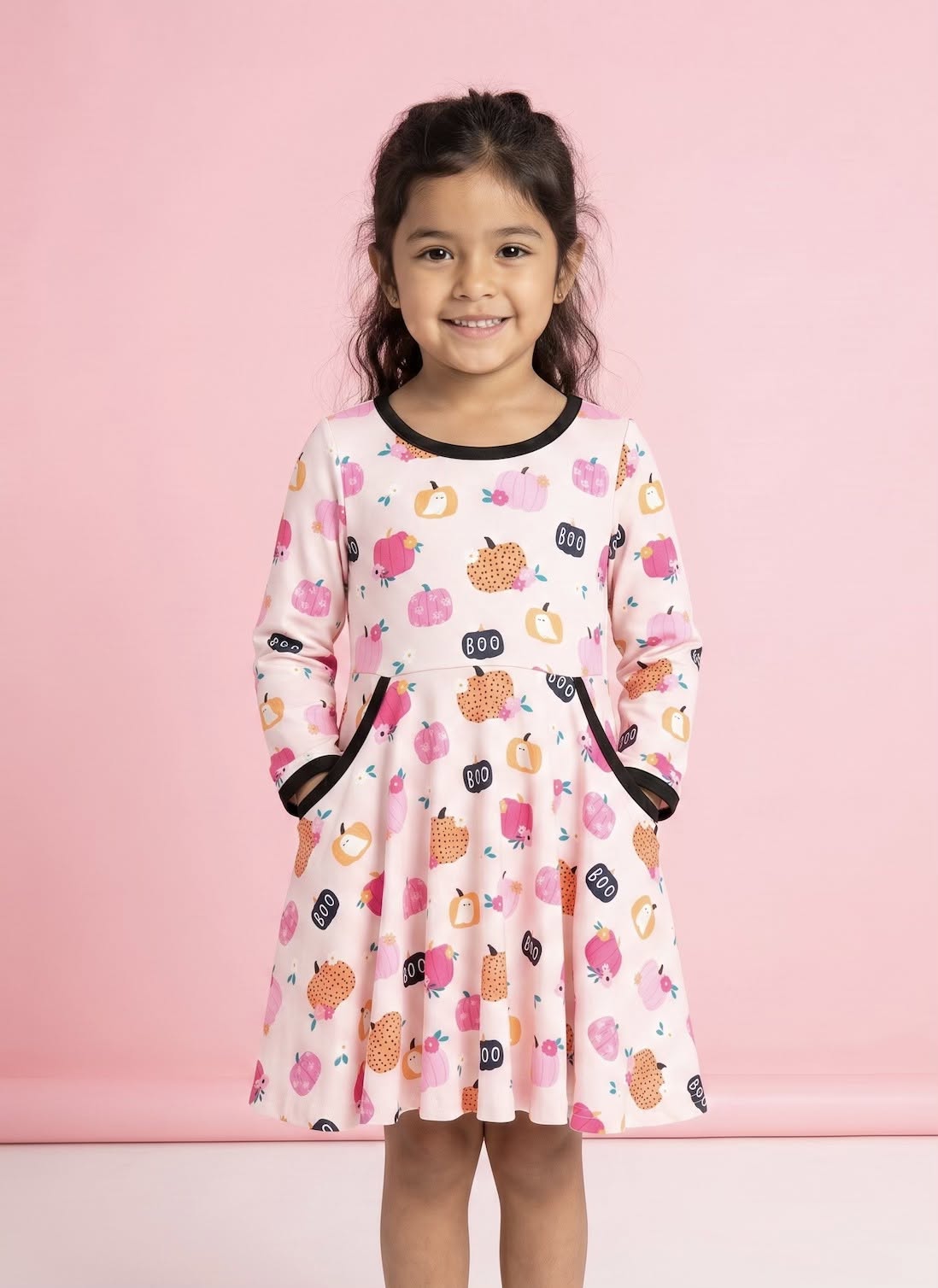 Boo-tiful Patch Dress on model - girl wearing pumpkin print dress with black contrast trim