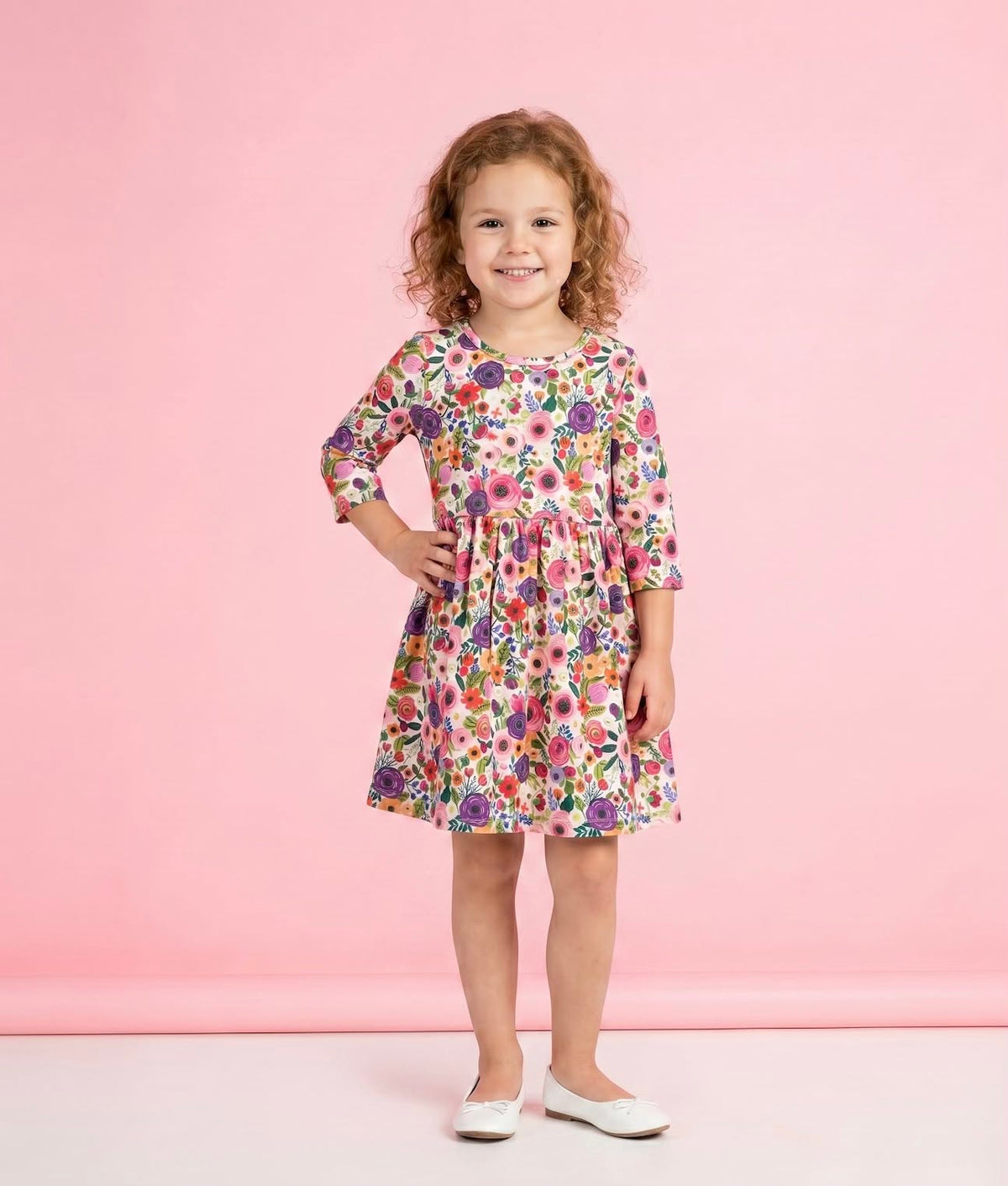 Bloom Burst Girl Dress - model wearing cream floral rose print 3/4 sleeve dress
