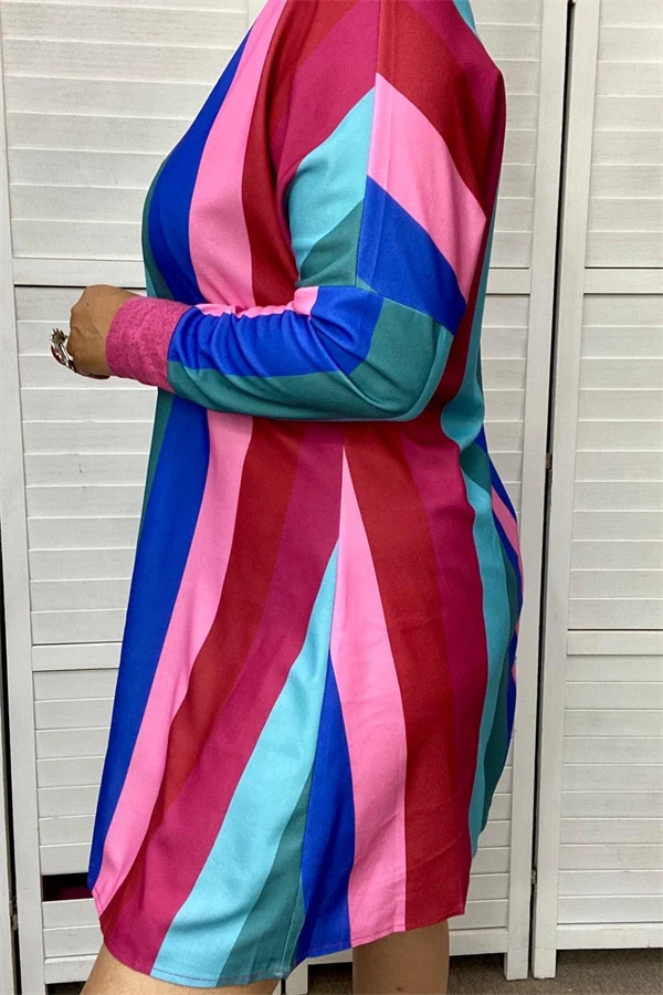 Side view of women's multicolor striped long-sleeve dress.
