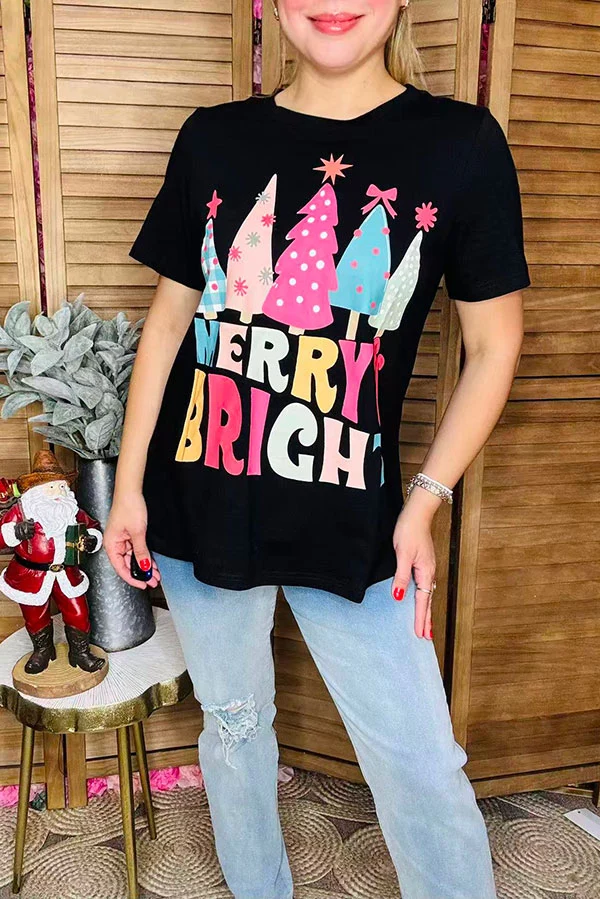 Angled front view of women's MERRY BRIGHT Christmas graphic T-shirt