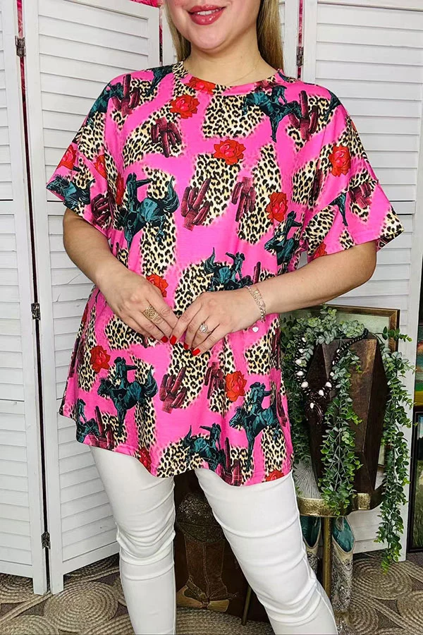 Close-up of women's pink leopard and western print blouse
