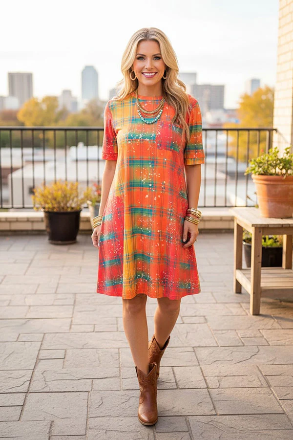 Full front view of women's orange coral yellow and teal checked print short sleeve dress