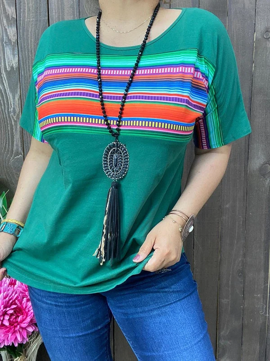 Women's green short sleeve top with multicolor striped chest panel