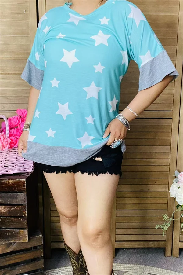 Front detail of women's turquoise star-print top with contrasting gray trim.