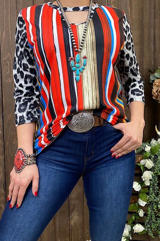 Women's multicolor serape-striped top with black-and-white leopard-print three-quarter sleeves and keyhole neckline.