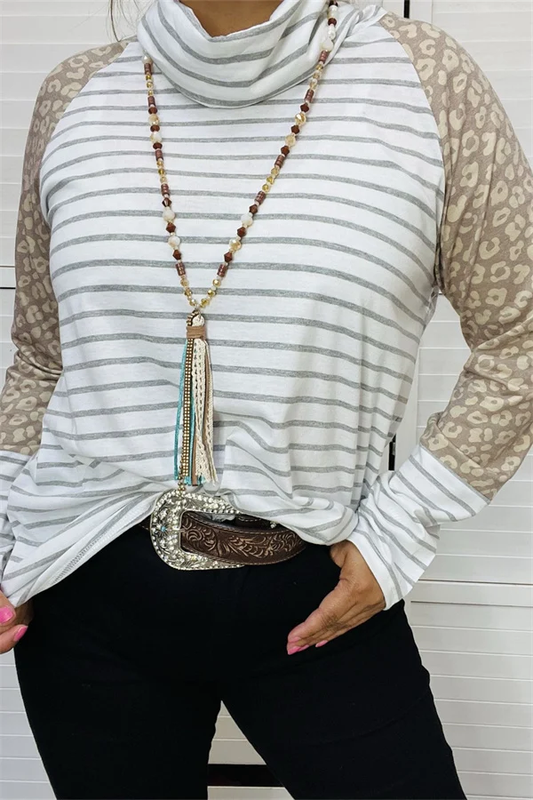 Women's striped turtleneck pullover with taupe leopard-print long sleeves and striped cuffs.