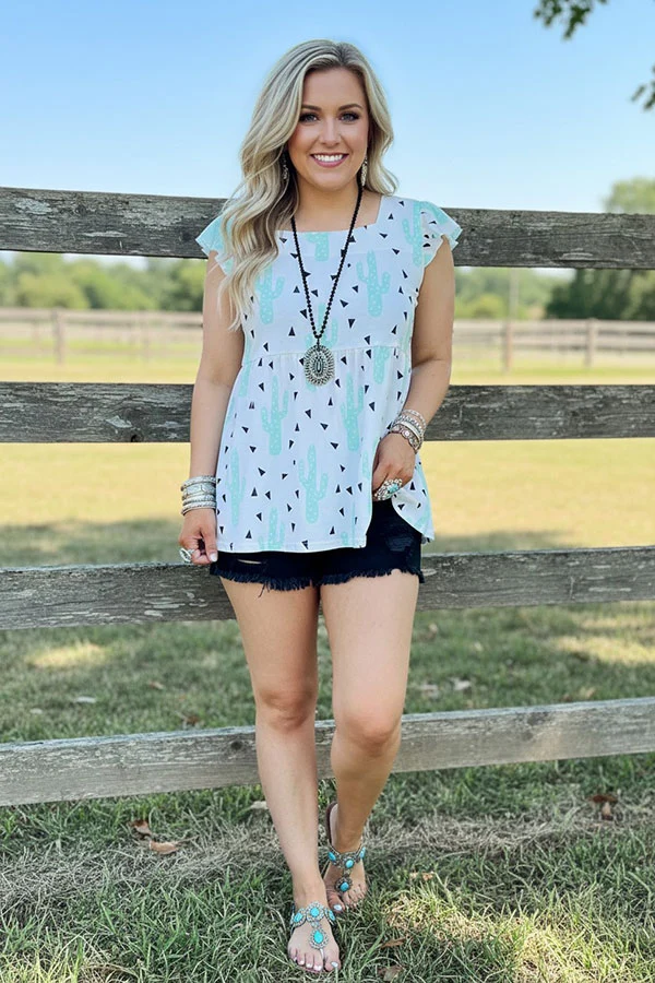 Full front view of women's white mint cactus print top with ruffle sleeves
