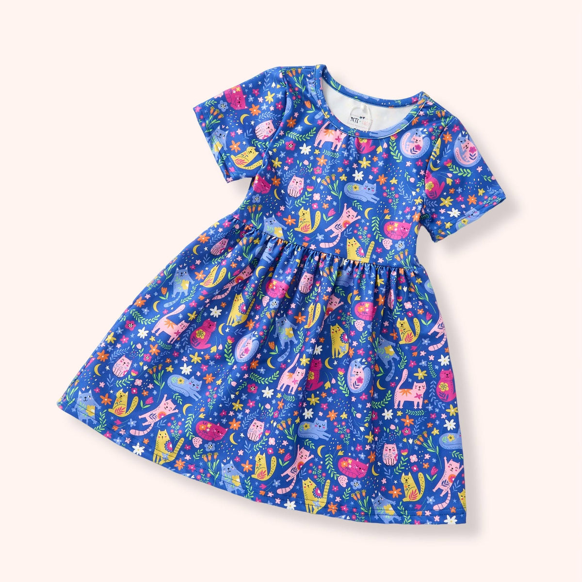 Meow Magic Girl Dress - blue cat and floral print flat lay
