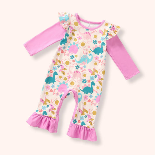 Colorful Jurassic Dreams dinosaur-print infant romper with pink ruffle details
