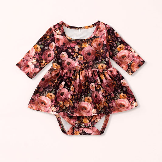 Autumn Embers floral baby romper with a full skirt