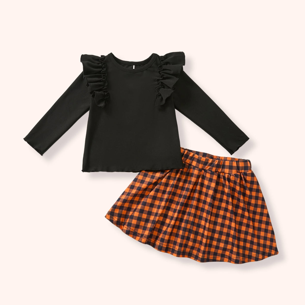 Black ruffle top with orange-and-black Harvest Gingham skort